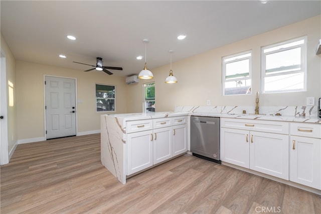 kitchen featuring white cabinetry, light hardwood / wood-style flooring, dishwasher, and a healthy amount of sunlight