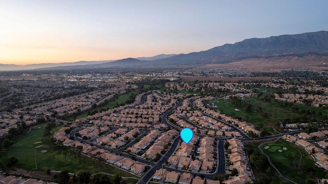 aerial view at dusk with a mountain view