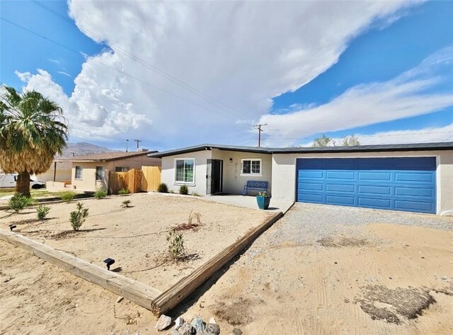 ranch-style house with a garage