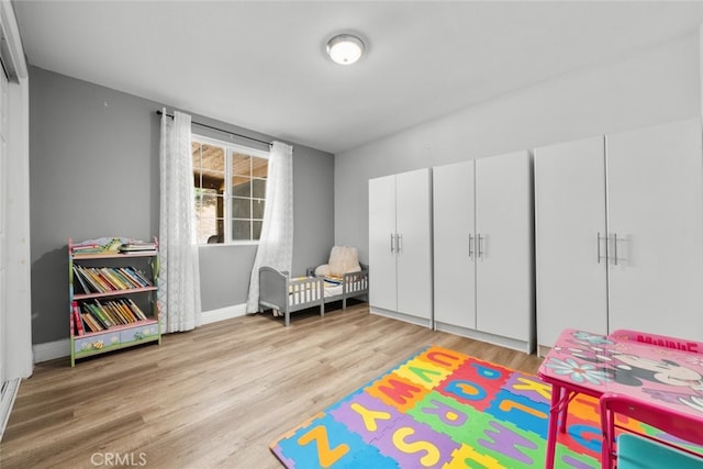 playroom featuring hardwood / wood-style floors