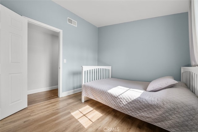 bedroom featuring light hardwood / wood-style floors