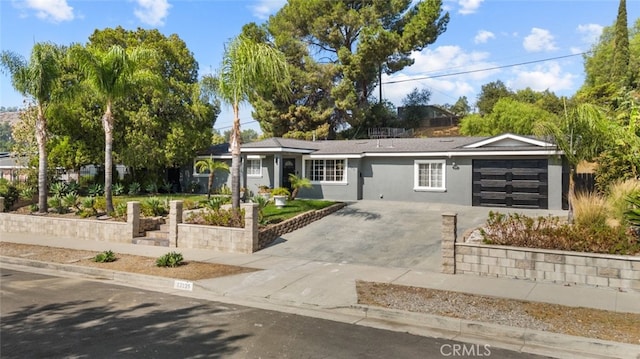 single story home with a garage