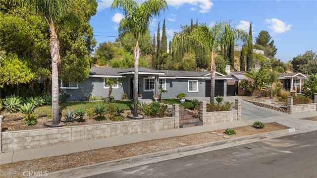 single story home featuring a garage