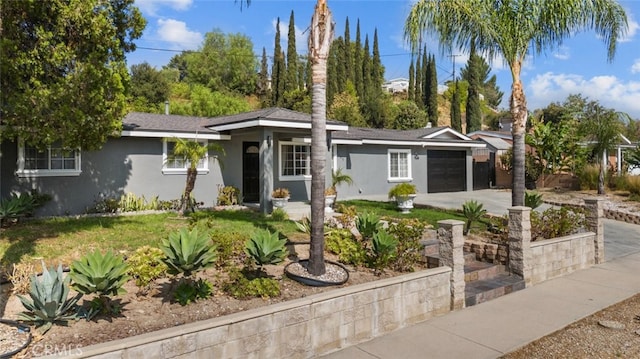 single story home featuring a garage