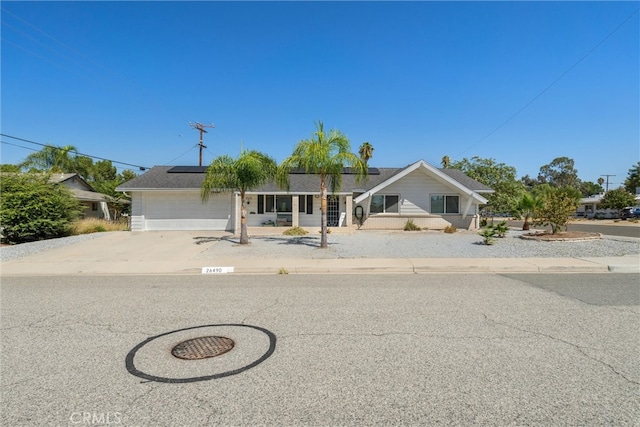 single story home with a garage