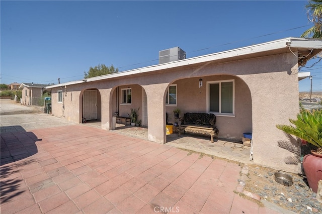 back of house featuring a patio