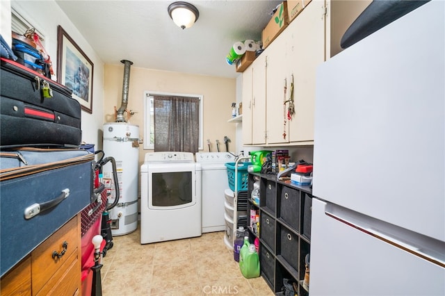 clothes washing area with independent washer and dryer, light tile patterned floors, and secured water heater