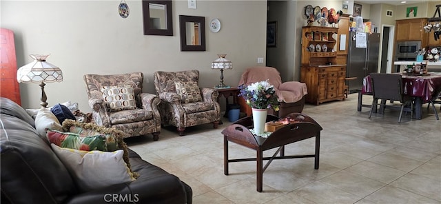 living room featuring light tile patterned floors