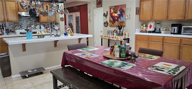 view of tiled dining room