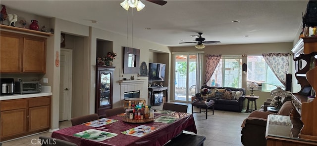 dining area with ceiling fan