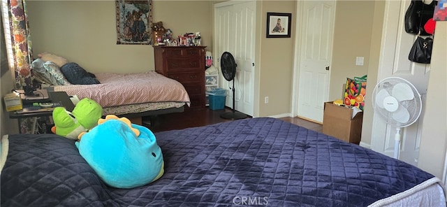 bedroom featuring dark hardwood / wood-style floors