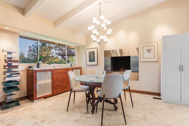 dining area with light tile patterned floors, lofted ceiling with beams, and a notable chandelier