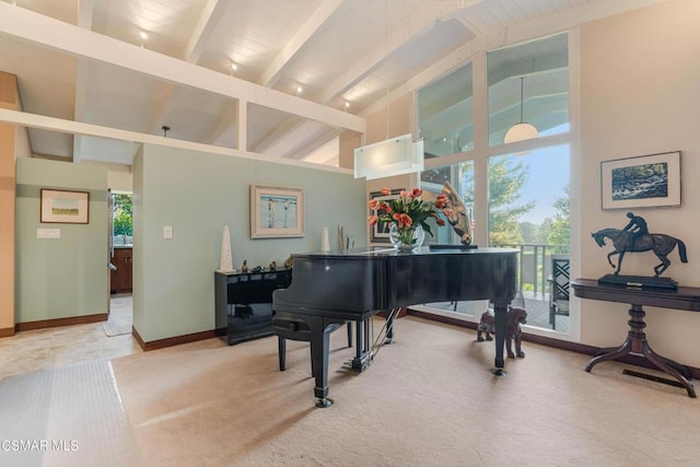 misc room with beam ceiling, carpet floors, and high vaulted ceiling