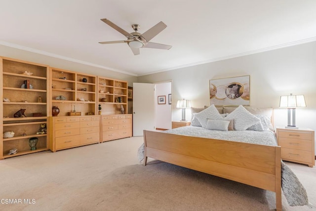 carpeted bedroom with crown molding and ceiling fan