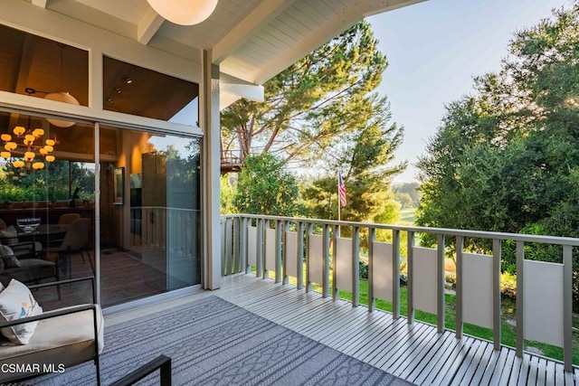 wooden terrace with ceiling fan