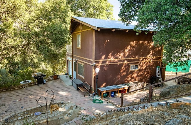 back of house featuring a patio area