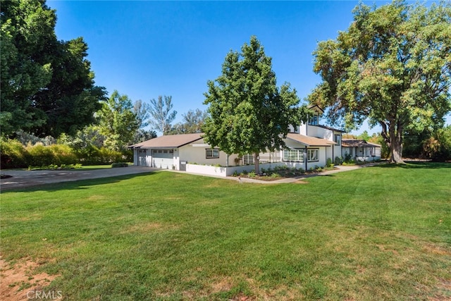 view of yard with a garage