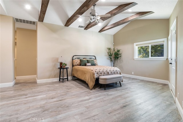 bedroom with vaulted ceiling with beams, ceiling fan, and light hardwood / wood-style flooring