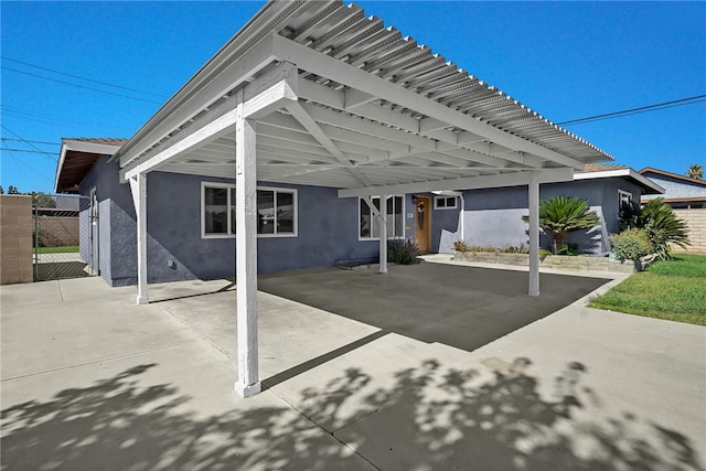 view of patio with a carport