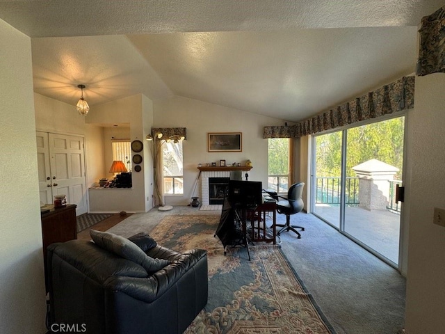 living room with a fireplace, carpet floors, and vaulted ceiling