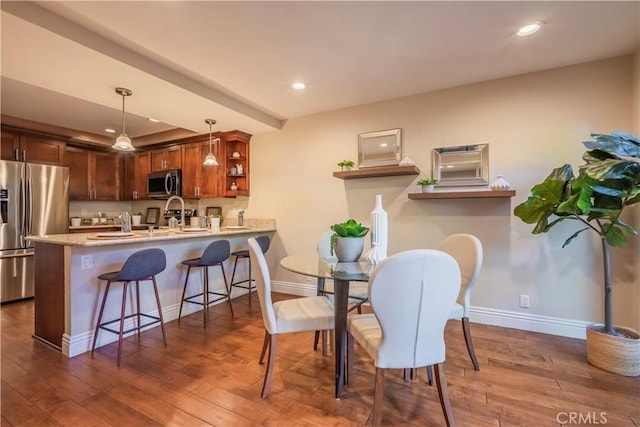 dining area featuring hardwood / wood-style flooring