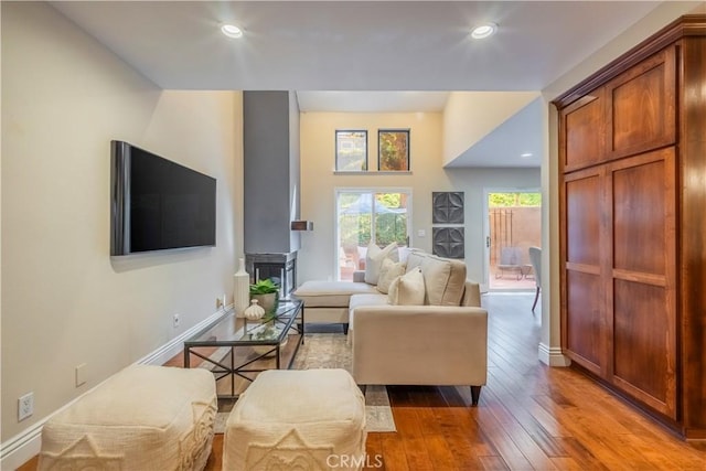 living room with light hardwood / wood-style floors