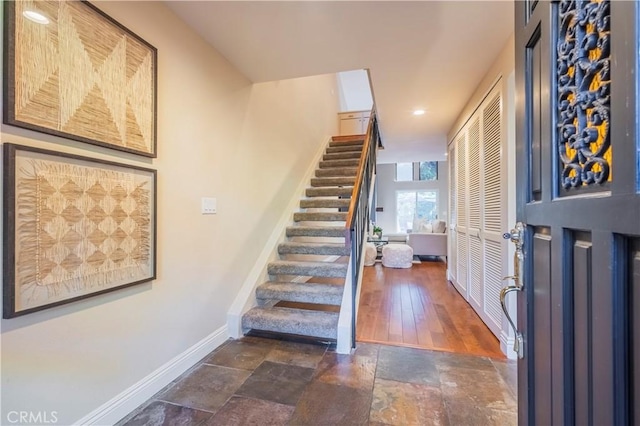 foyer with dark hardwood / wood-style flooring