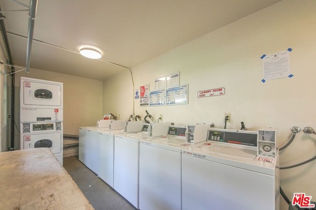 laundry area featuring stacked washer and dryer and washer and dryer