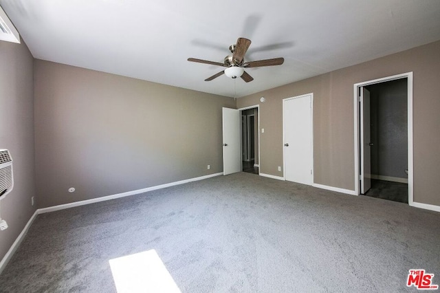 unfurnished bedroom featuring ceiling fan and carpet floors