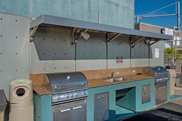 view of patio / terrace with area for grilling, grilling area, and sink