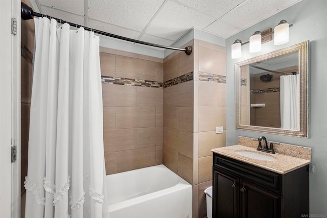 bathroom with shower / tub combo and vanity