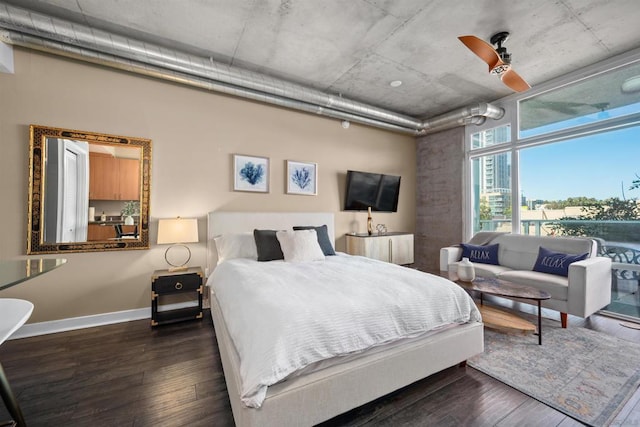 bedroom featuring ceiling fan and dark wood-type flooring