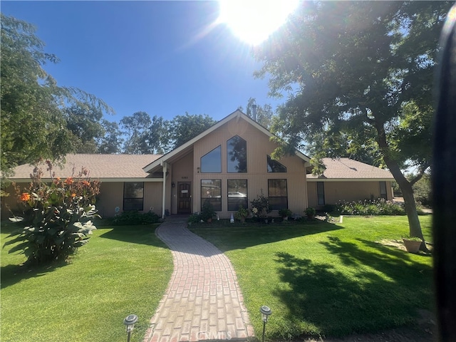 view of front of home with a front lawn