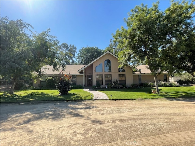 view of front of house with a front lawn