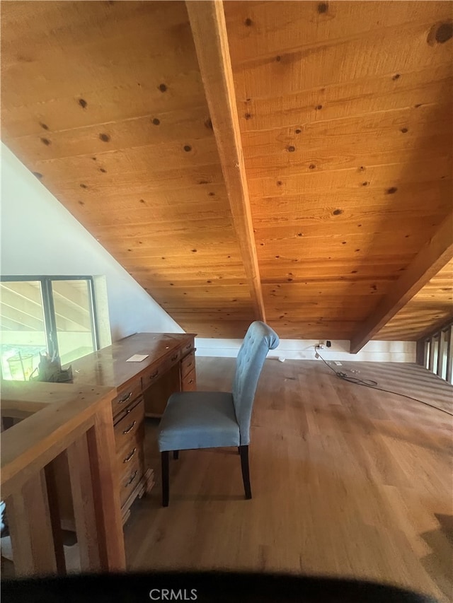 unfurnished office with wooden ceiling, beamed ceiling, and light hardwood / wood-style flooring