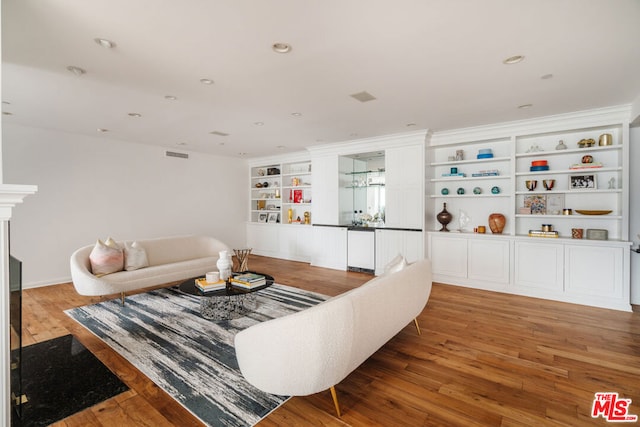 living room with hardwood / wood-style flooring