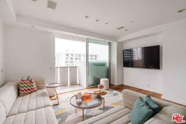 living room with hardwood / wood-style flooring