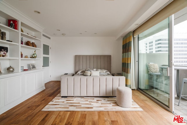 bedroom with light hardwood / wood-style floors