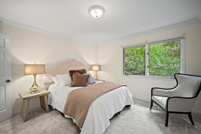 carpeted bedroom with crown molding