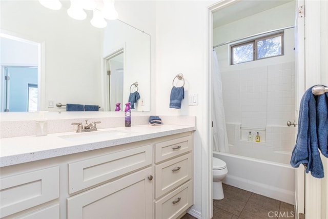 full bathroom featuring shower / bath combination with curtain, tile patterned flooring, vanity, and toilet