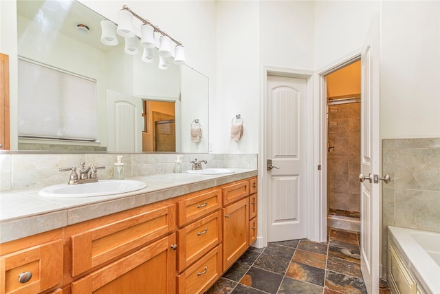 bathroom with vanity and plus walk in shower