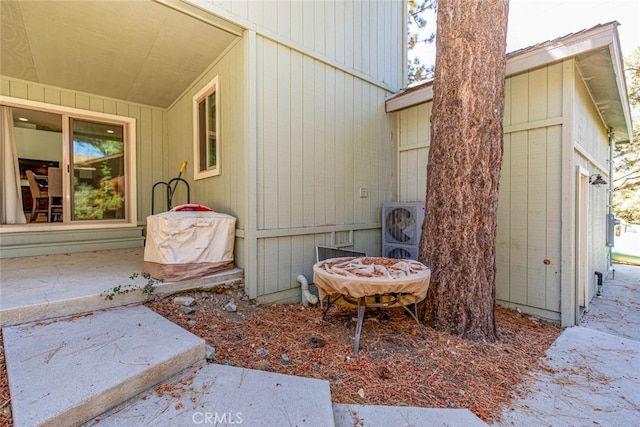 view of property exterior featuring a patio area