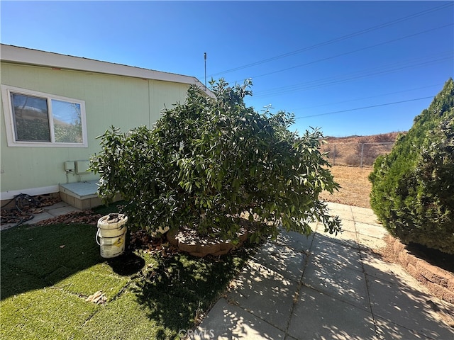 view of property exterior featuring a patio