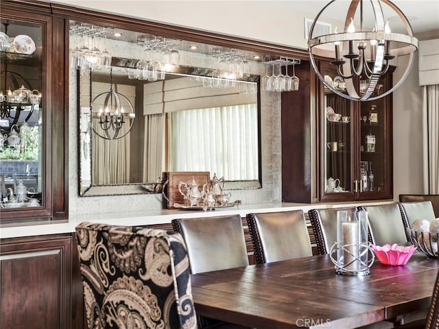 dining room featuring a chandelier