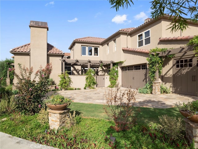 exterior space with a yard and a garage