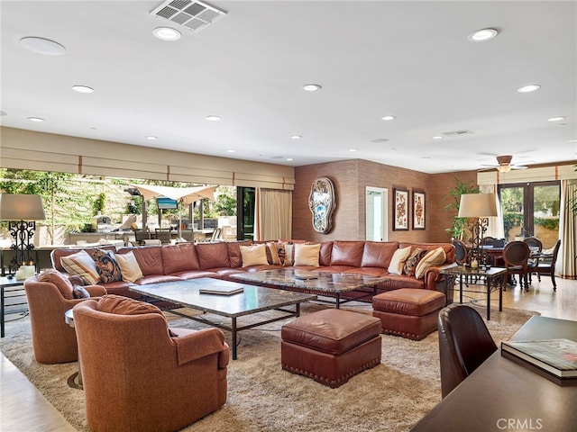 living room featuring ceiling fan