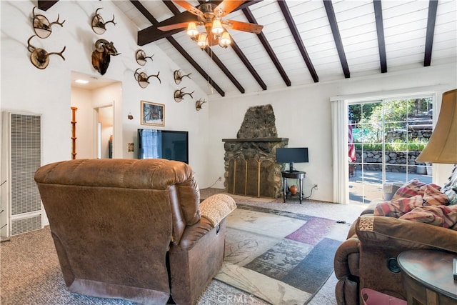 carpeted living room with high vaulted ceiling, ceiling fan, beamed ceiling, and a stone fireplace