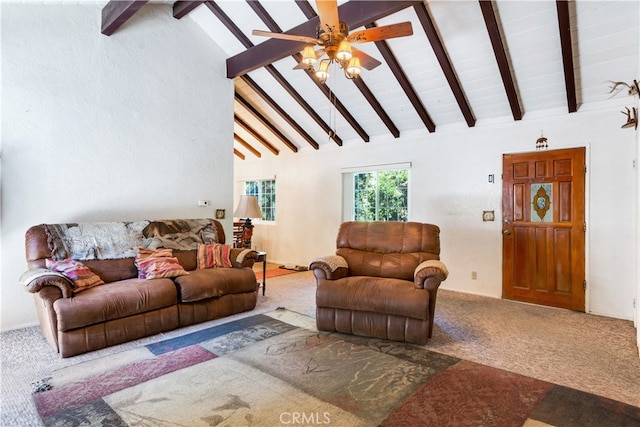 living room featuring ceiling fan, beamed ceiling, and carpet floors