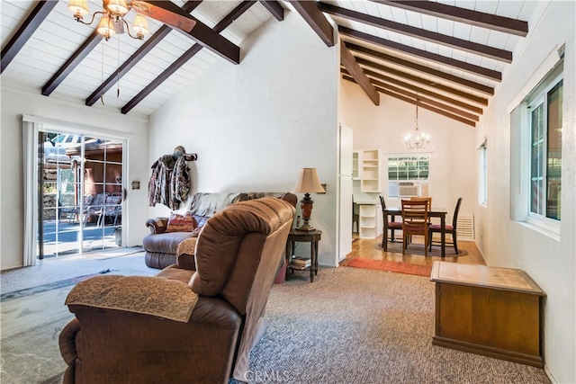 carpeted living room with beamed ceiling, a chandelier, and high vaulted ceiling