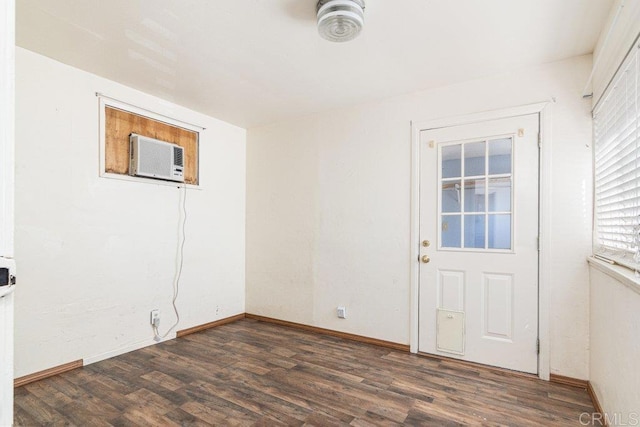 spare room featuring dark hardwood / wood-style floors